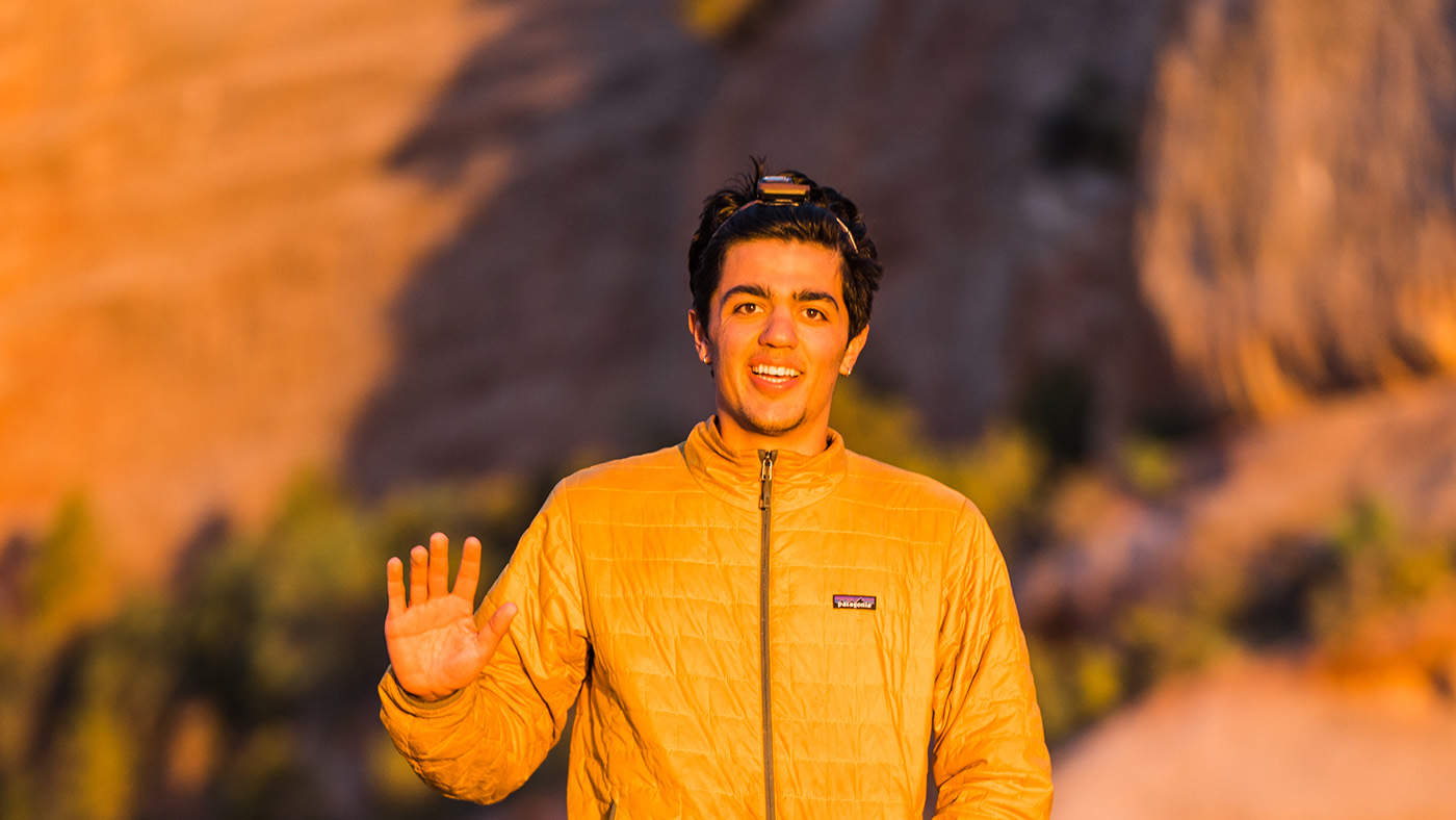 Student waving